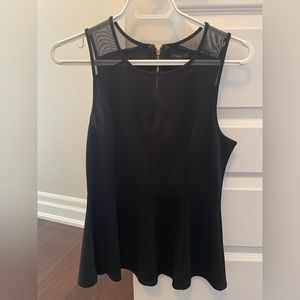 Peplum top with mesh New With Tags